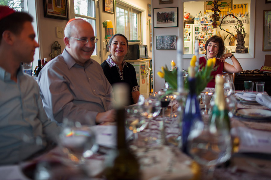 Debbie sits at the head of the family table during passover in spring of 2011. Left to right, her nephew Yonah, her husband Ed, her sister-in-law Janice, and Debbie.